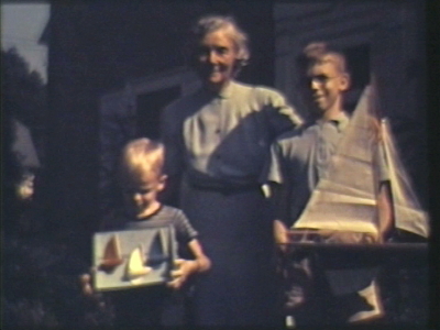 Mrs. Patthson, boats, digging crab grass in lower beds--Walkling Family--home movies. Reel 8