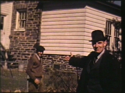 April 1940, first iris, arborvitae hedge--Walkling Family--home movies. Reel 12