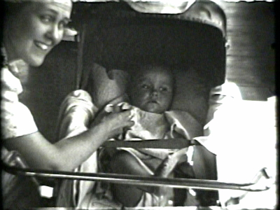 Baby Dana Gregory, airport, 1940--Gilbert Pond--home movies. Reel 8